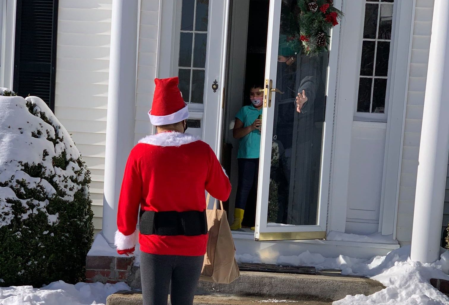 Ana went the extra mile this holiday season, playing Santa and delivering gifts to girls. 