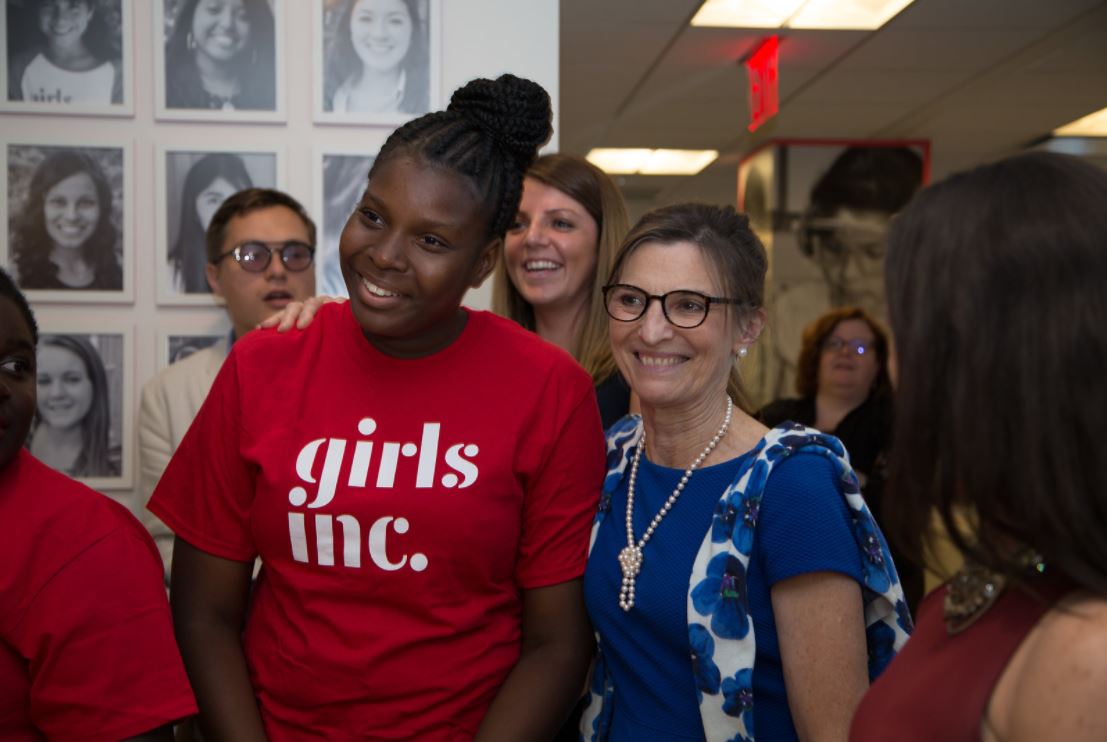 What is the role of a mentor at Girls Inc.?
